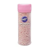Confitillo en Forma de Perlas Color Rosado WILTON 710-1132